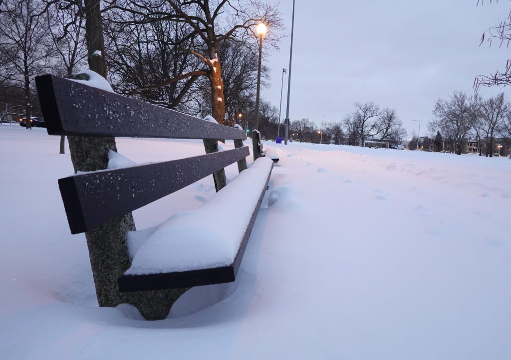 snow-covered bench
